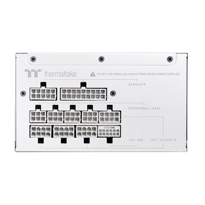 White Thermaltake Toughpower XT modular power supply unit showing labeled cable connection ports.